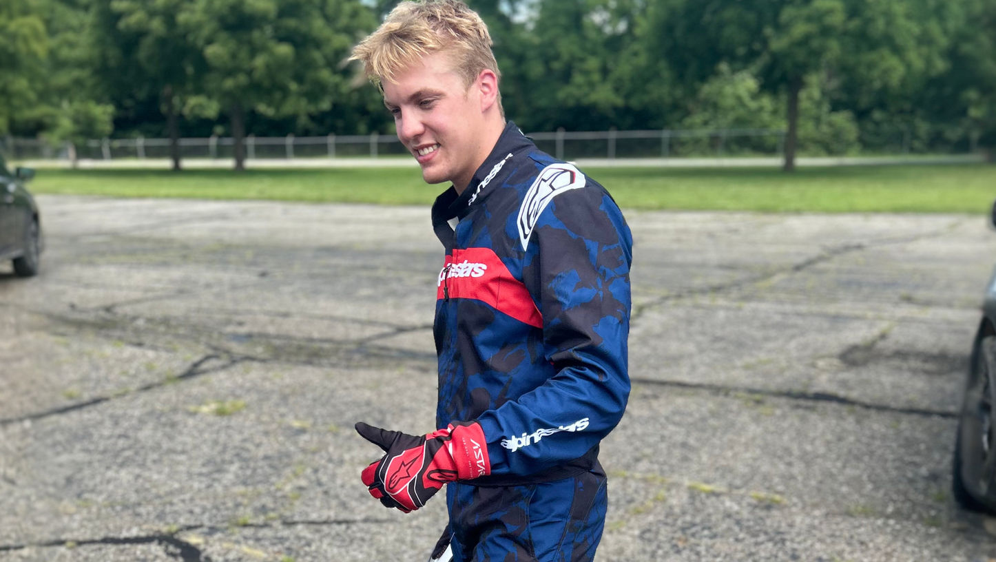 Owen Neisel in racing suit at the track